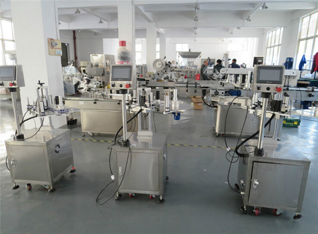 Factory view of flat surface top labelling machines