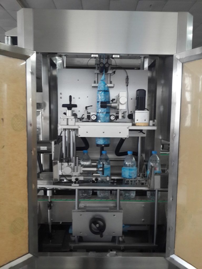 Lableing system of shrink sleeve labeling machine