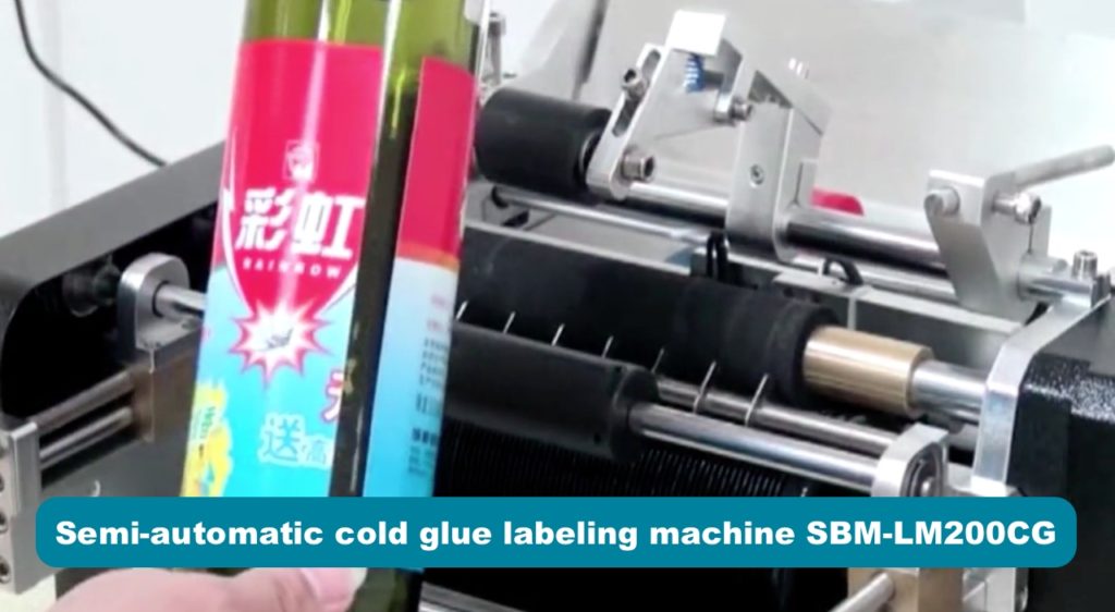 Semi-automatic cold glue labeling machine for round bottles