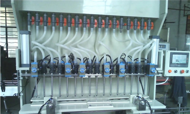 Close view of linear anti-corrosion filling equipment for strong liquid
