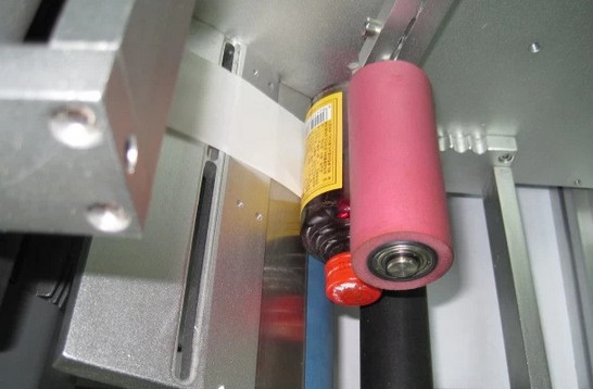 Rolling pad of the semi automatic round bottle labeling machine